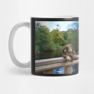 Little bear soft toy sitting on the fence Mug